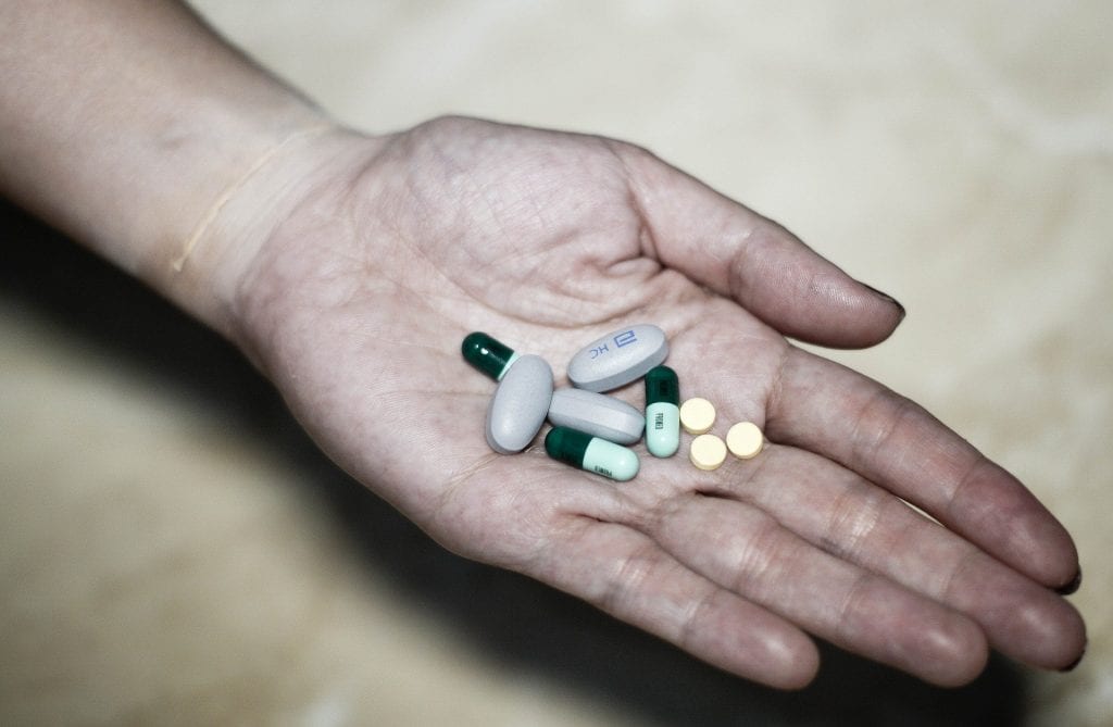 drugs in a male hand